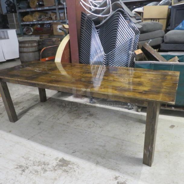 8-foot solid wooden table with 4 legs, glossy finish, dimensions 96x38x30 inches, excellent condition.