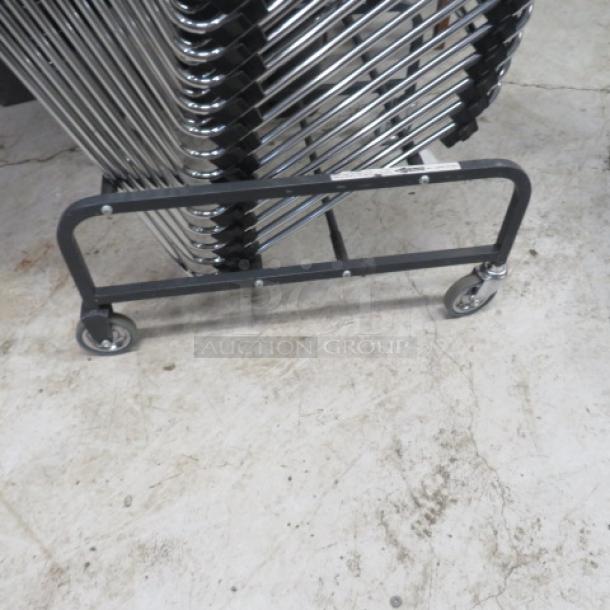 Metal chair cart on casters, black frame, used for transporting stacked chairs, no chairs included.