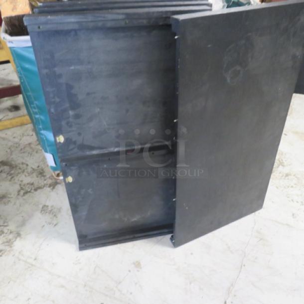 Adjustable table with 2 end pieces and 4 inserts, extendable to 8 feet. Black finish, ideal for various group sizes. Size 98x37.5x30 inches.