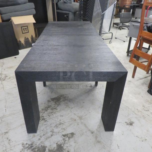 Extendable table with 2 end pieces, 4 inserts; extends to 8 feet. Dimensions: 98x37.5x30 inches. Suitable for large or small groups.