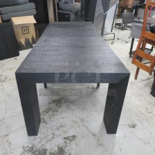 Extendable dark wood table with 2 end pieces, 4 inserts. Measures up to 8 feet. Dimensions: 98x37.5x30 inches. 