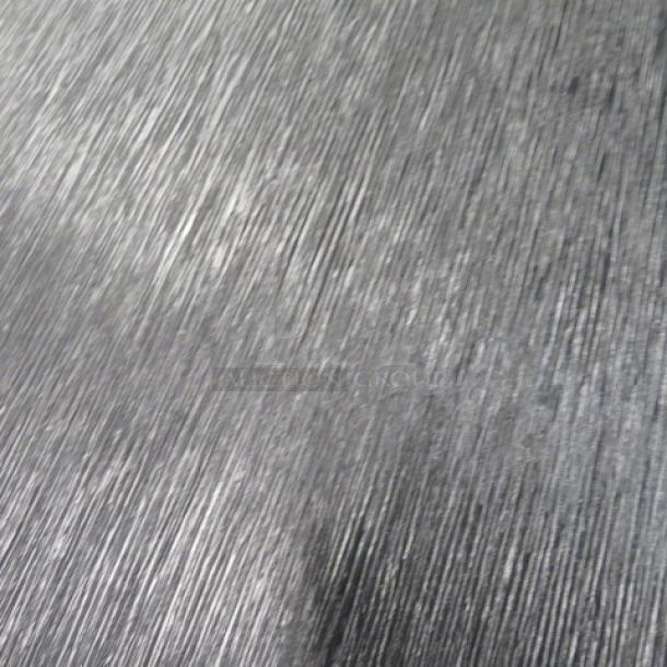 Close-up texture view of a wooden extendable table surface. Table size: 98x37.5x30 inches, can extend up to 8 feet.