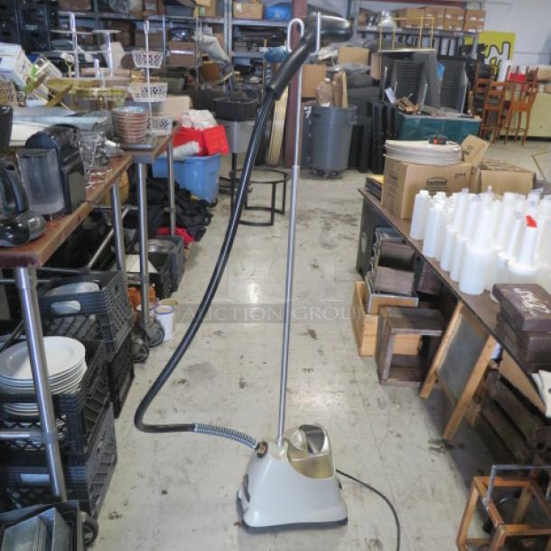 Jiffy Steamer J-2000, 120 Volt, in used condition. Features a tall hose and water reservoir. Priced at $270.00.
