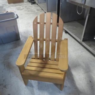 Casa Fiela wooden kid-size Adirondack chair, natural finish, in good condition, slatted back and seat design.