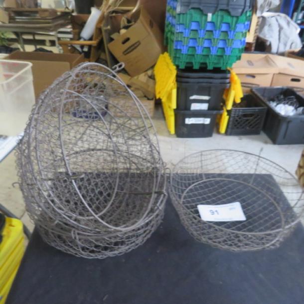 11-inch round wire basket, rustic design. Appears in used condition. Auction lot number 91 visible.