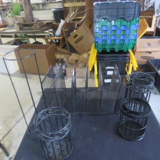 A lot of miscellaneous items including wire organizers and a stack of plastic bins in mixed condition.