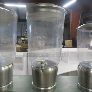 Stainless steel and polycarbonate XL beverage dispenser, features a spout, slightly used condition.