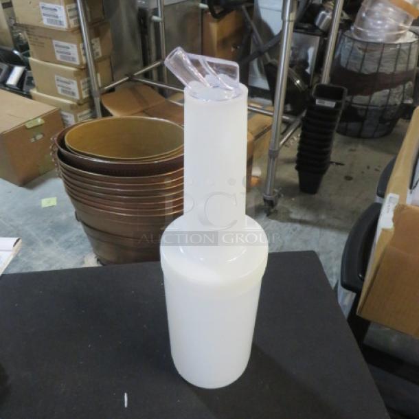 Store And Pour bottle, white plastic with clear spout, used for easy dispensing. 10XBID model, in good condition.