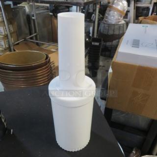 White plastic Store And Pour container, missing pourer, in good condition. Model 8XBID. Used for beverage storage.