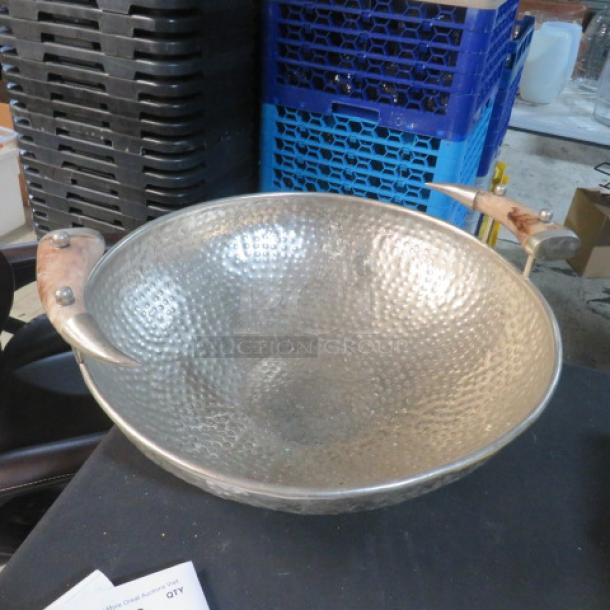 Hammered round serve bowl with antler handles, 20.5 inches, unique design, excellent condition.