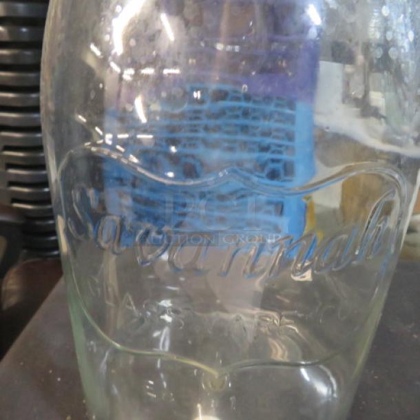 Savannah Glassware beverage dispenser, clear glass, embossed branding. Good condition, ideal for drinks display.