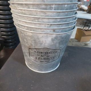 7.5x6 galvanized bucket with "Main Street Farm Co" label. Durable, rustic style, great for decorative use or storage.