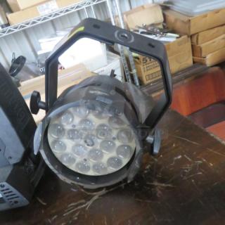 Elation Arena Par Zoom stage light, showing lens array and mounting bracket, in good condition. Model tag visible.