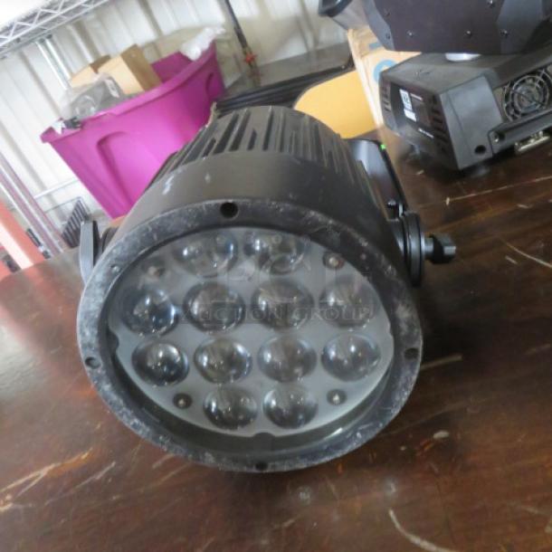 Chauvet Slim Par Pro QZ12 LED wash light, black, round, with visible 12 LED array. Used condition, priced at $855.00.