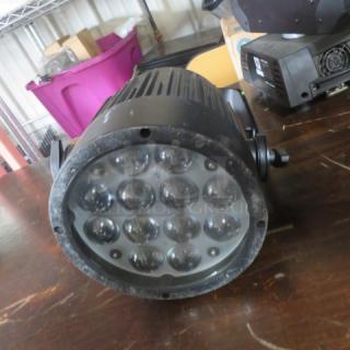 Chauvet Slim Par Pro QZ12 LED wash light, black, round, with visible 12 LED array. Used condition, priced at $855.00.