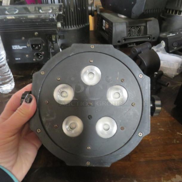 ADJ Mega Tripar Profile LED Stage Light, five bulbs, black casing, used condition, model name visible on equipment.