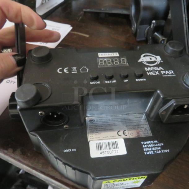ADJ Mega Hexpar Profile LED stage light. Features mode setup, CE marking, DMX input. Good condition, model number visible.