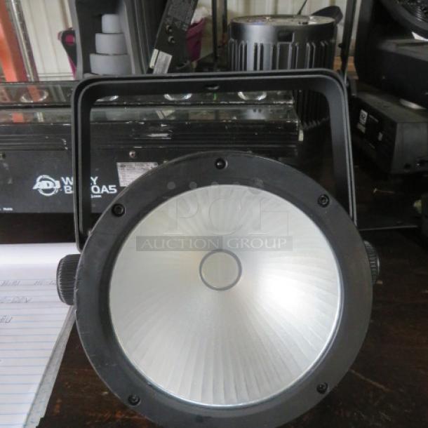 Chauvet Core Par UV120ILS UV Wash Light, black casing, circular lens, good condition, priced at $429.99.