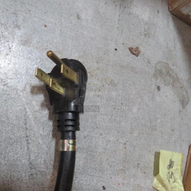 NEW Cord 3XBID, heavy-duty 3-prong plug, durable black casing, excellent condition, ideal for power tools.
