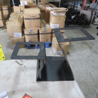 Black Rosetto Swan Riser Frame, model SM340, 22x8x12 inches, metal, excellent condition. Price: $632.33 each.
