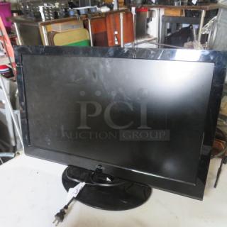 LG Flatron 21.5" LCD LED Monitor, Model E2251T-BN, black, used condition, visible power cord, minor surface wear.