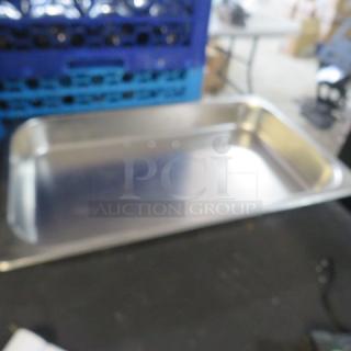 Full-size 2.5-inch hotel pan in stainless steel; gently used, smooth finish, ideal for catering or food service.