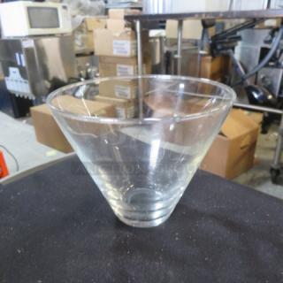 Clear stemless martini glass, slightly tapered design, in good condition. No visible markings or labels.