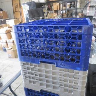 Blue and gray 16-hole dishwasher rack, model 2XBID, in used condition, ideal for commercial use.