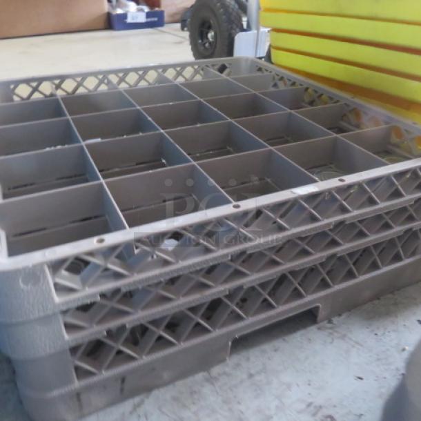 Assorted dishwasher rack with multiple compartments, gray plastic, minimal wear, labeled "2XBID."