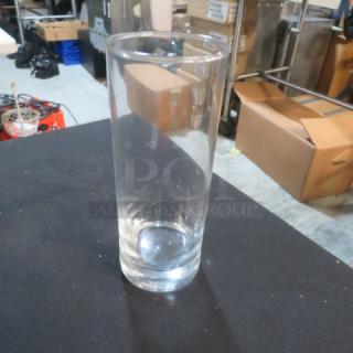 Clear tall bar glass, model 8XBID, in excellent condition. Smooth surface, cylindrical shape, suitable for bar use.
