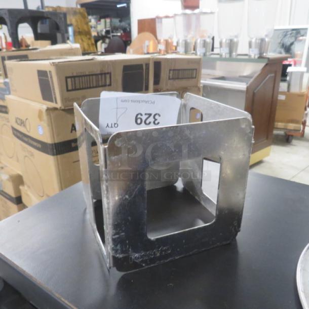 Rosetto Stainless Steel Buffet Warmer, 5.5x5, in good condition. Marked "Rosetto." Auction tag showing "329."