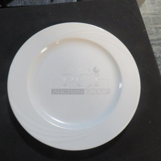 10.5-inch Schonwald plate, model 6205, features subtle embossed lines, excellent condition, ideal for collectors.