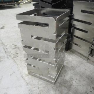 Rosetto Stainless Steel Riser, 6x12 inches, sleek modern design, excellent condition, priced at $302.82 each.