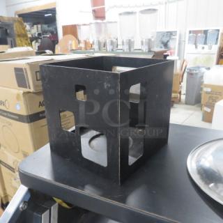 Rosetto Black Metal Buffet Warmer, 7x7 inches, in fair condition, features open design for heating; auction price $184.49 each.