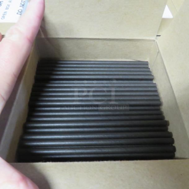 A box of 875 black paper drink straws, 7XBID model, new condition, shown open revealing neatly stacked straws.