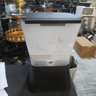 Tablecraft 3-gallon beverage dispenser, new condition, black lid and base, clear container, suitable for serving drinks.