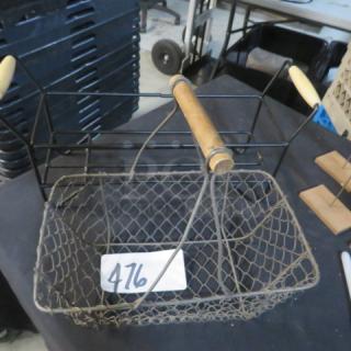 Wire basket with wooden handles, metal frame, labeled "476," in good condition. Suitable for holding various items.