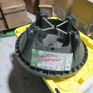 NEW 10ft Cinco Express Tree Stand in green. Includes label showing capacity and brand details. Unused, mint condition.