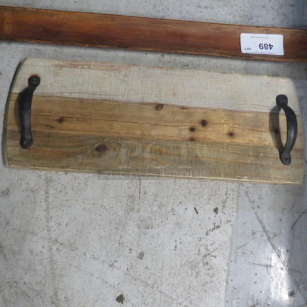 Assorted wooden decor server with rustic handles. Natural wood grain, rectangular design. Auction tag reads "Lot 489."