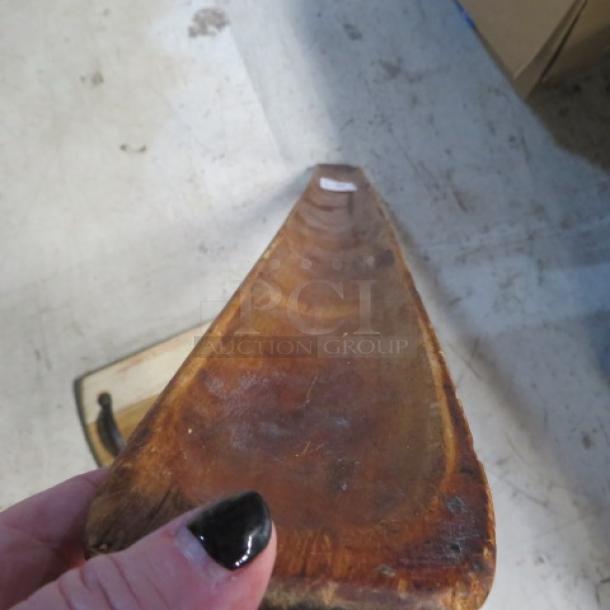 Assorted wooden decor server, triangular shape, natural finish, visible grain, slight wear, label reads "2XBID."