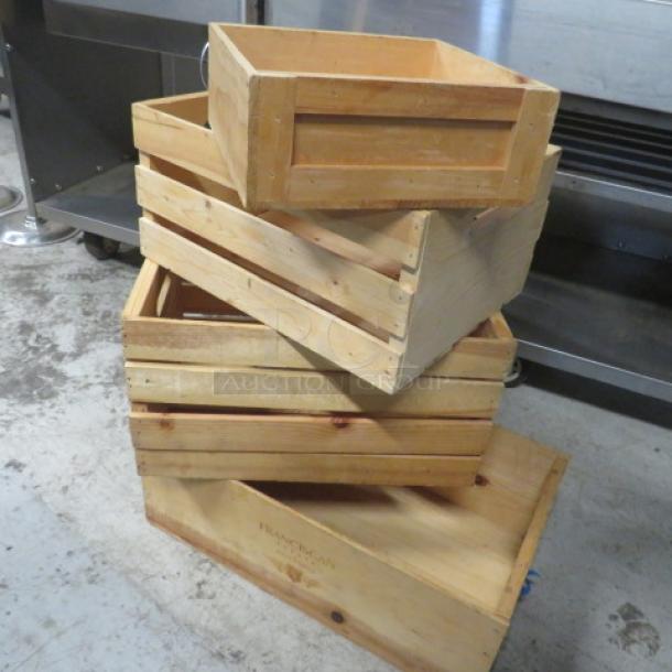 Assorted wooden decor boxes, four pieces, various sizes, natural finish, sturdy construction, ideal for storage or display.