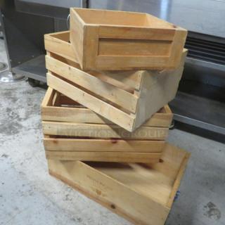 Assorted wooden decor boxes, four pieces, various sizes, natural finish, sturdy construction, ideal for storage or display.