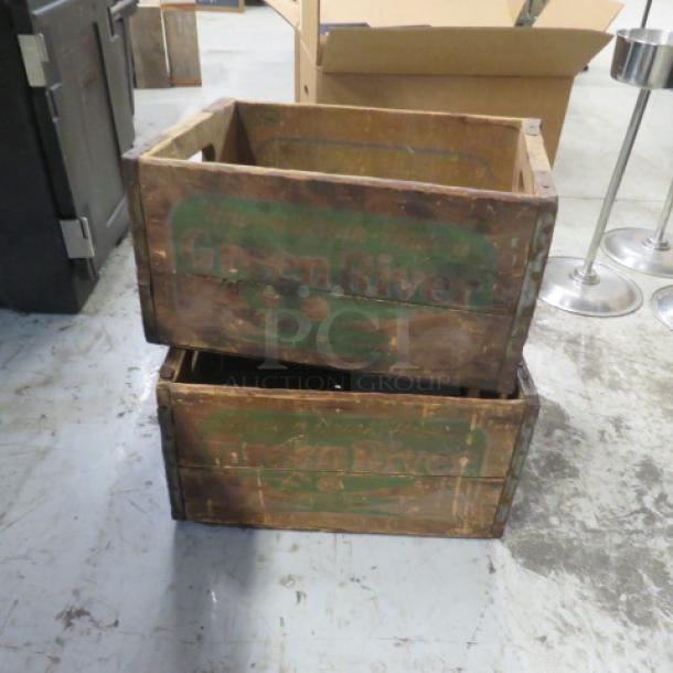 Vintage wooden box with "Green River" branding, distressed finish, visible wear, auction item 2XBID.