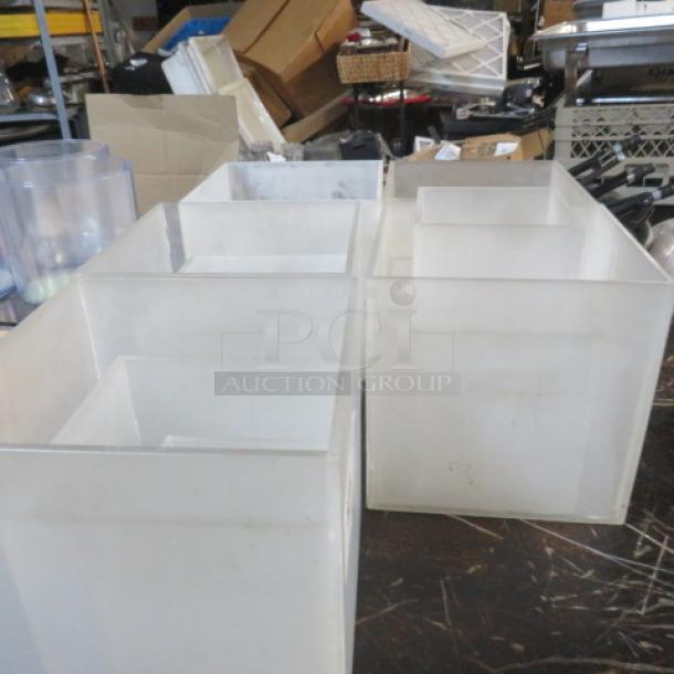 Assorted acrylic display stands in various sizes, used condition.
