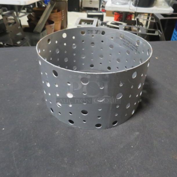 Front Of The House round buffet display riser, metal with perforated design, 8.5x4.5 inches, FOH branding visible, excellent condition.