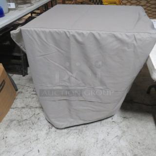 Covermates 36x36 grill cover in beige, in excellent condition. Features durable fabric and Covermates logo.