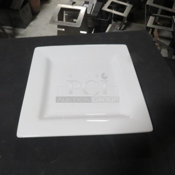 World 11-inch square plate, model SL-10. New condition, smooth white finish, ideal for modern dining.