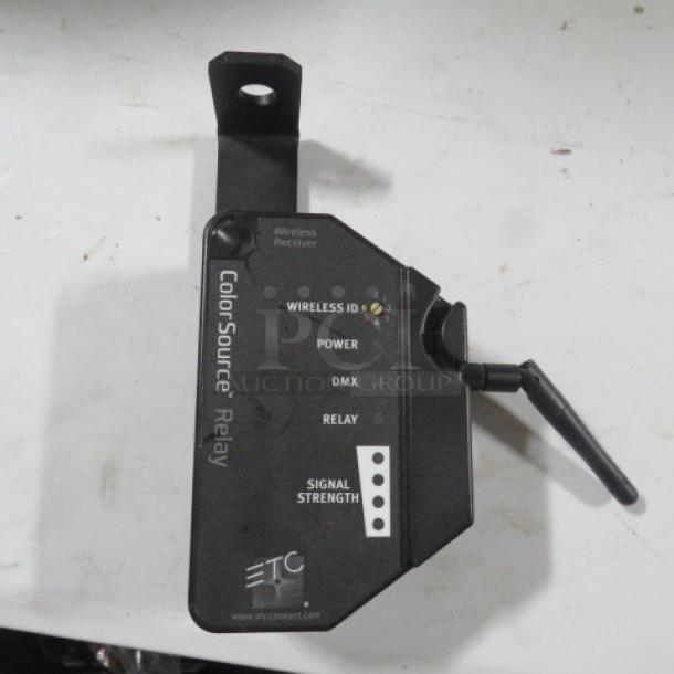 ETC Color Source Relay Wireless DMX Receiver, model Color Source, in good condition. Features visible labels for wireless ID, power, DMX, relay, and signal strength.