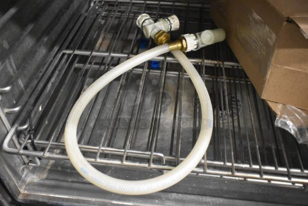 Blodgett HVH-100E HydroVection oven interior view showing shelves, hose, and fittings. Brand new, 208V, 3 Phase.