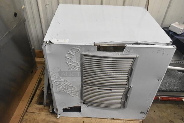 Brand new Scotsman MC1030MA-32A ice machine, 1077 lb capacity, 208/230V, with dents on sides, label showing "2 QTY".